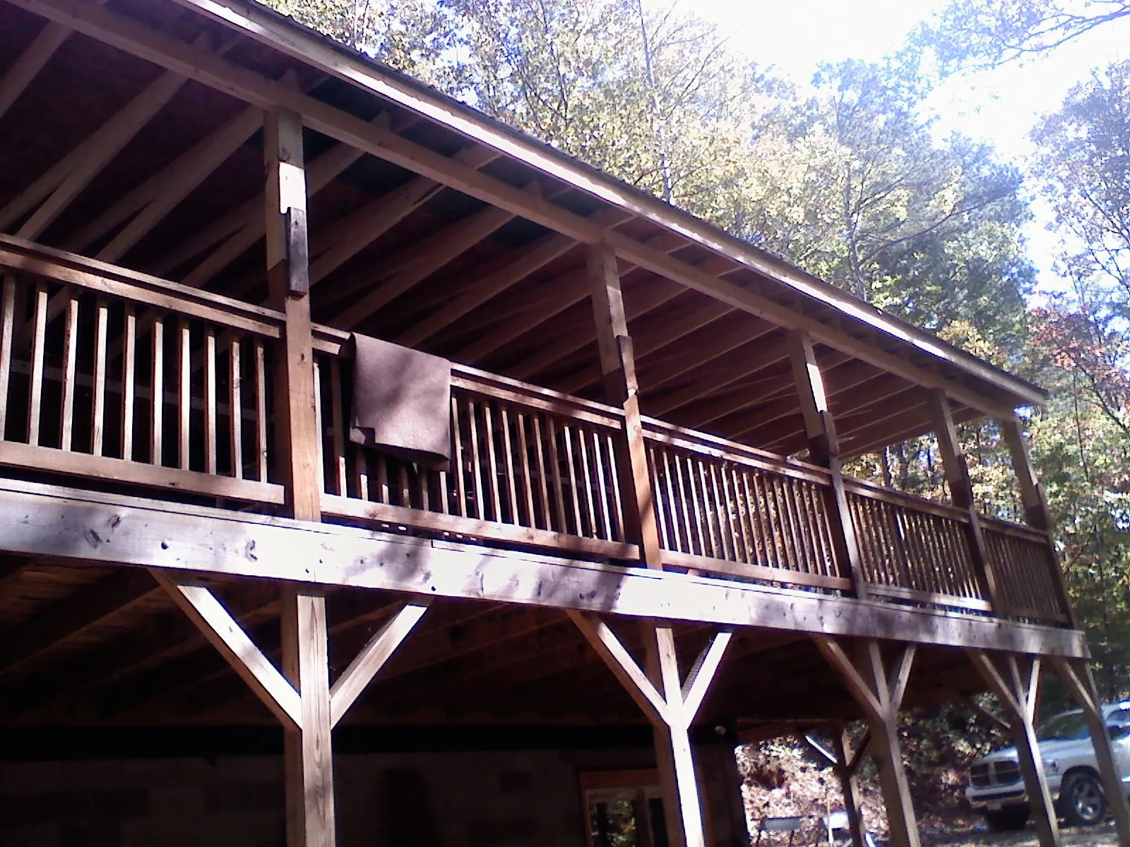 Timber framing under a new elevated porch and deck — Roof Leak Repair in North Salt Lake by Roofing Brothers